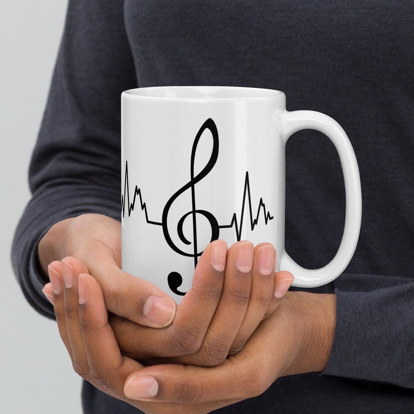 Taza con latidos de clave de sol