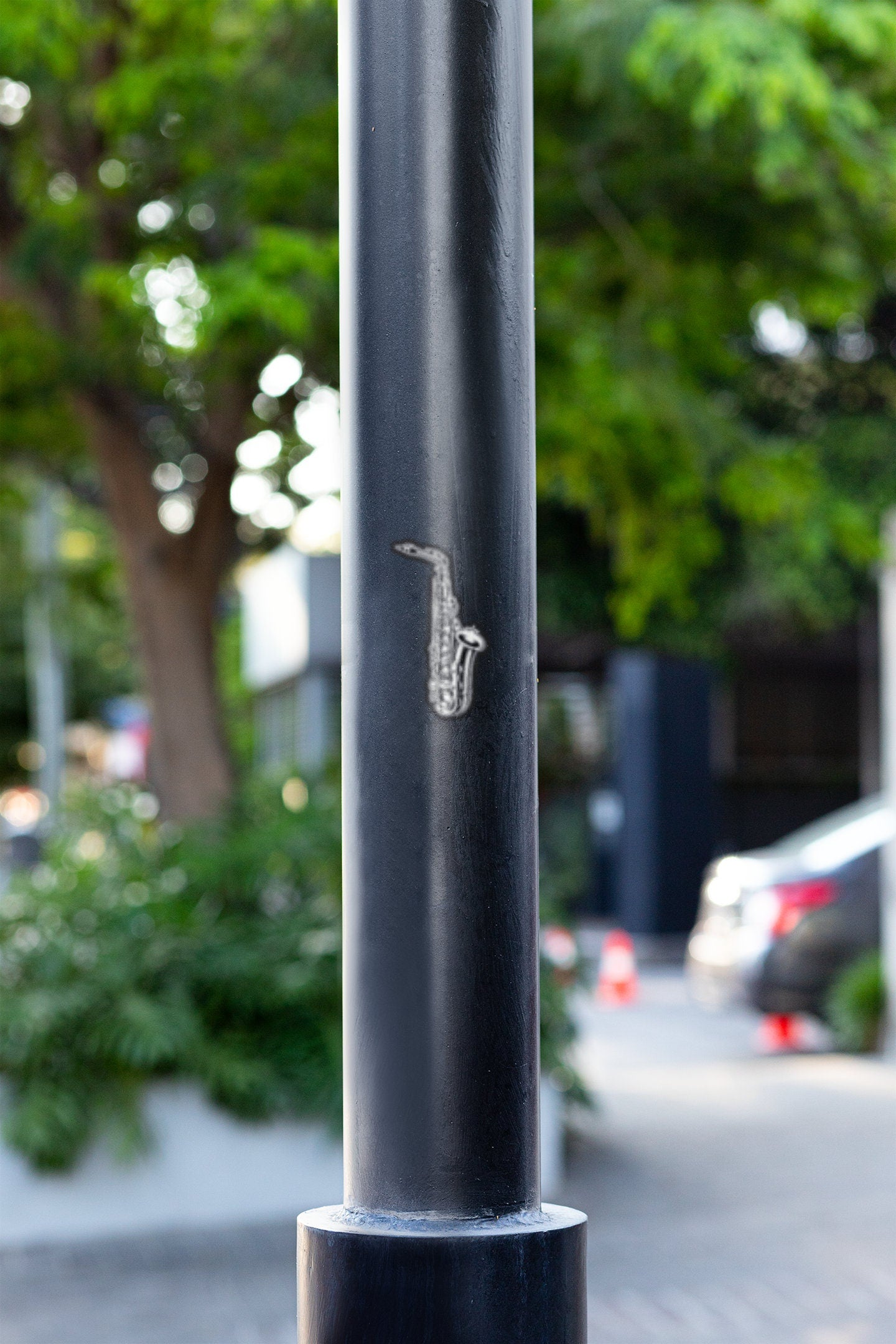 a close up of a pole with a musical instrument on it