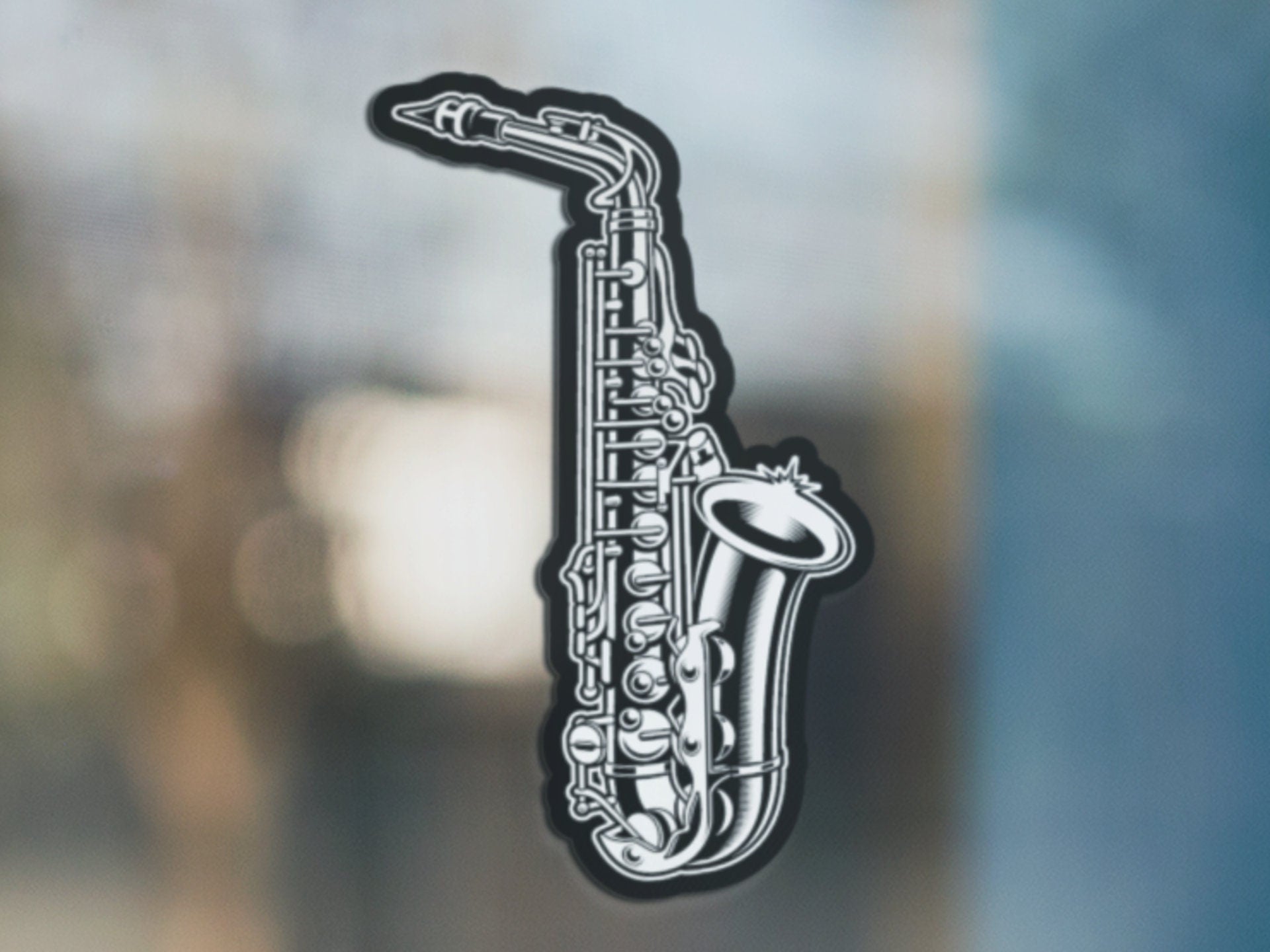 a black and white picture of a saxophone