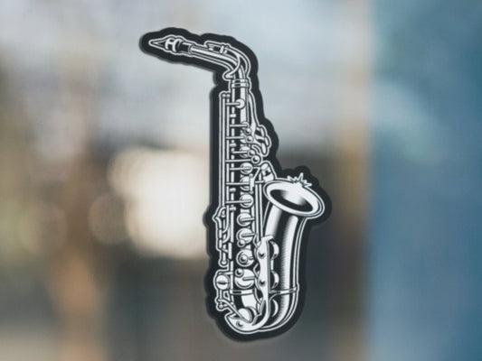 a black and white picture of a saxophone
