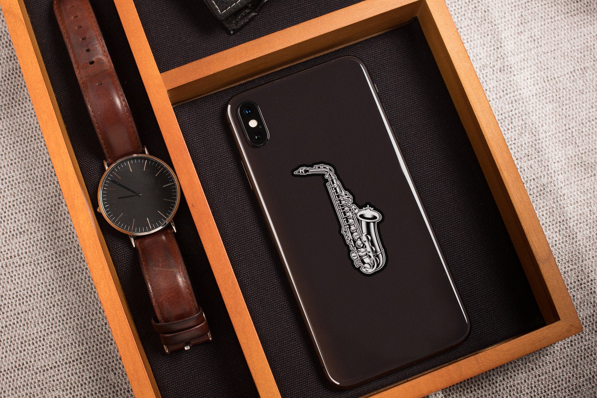 a watch and a watch in a wooden box