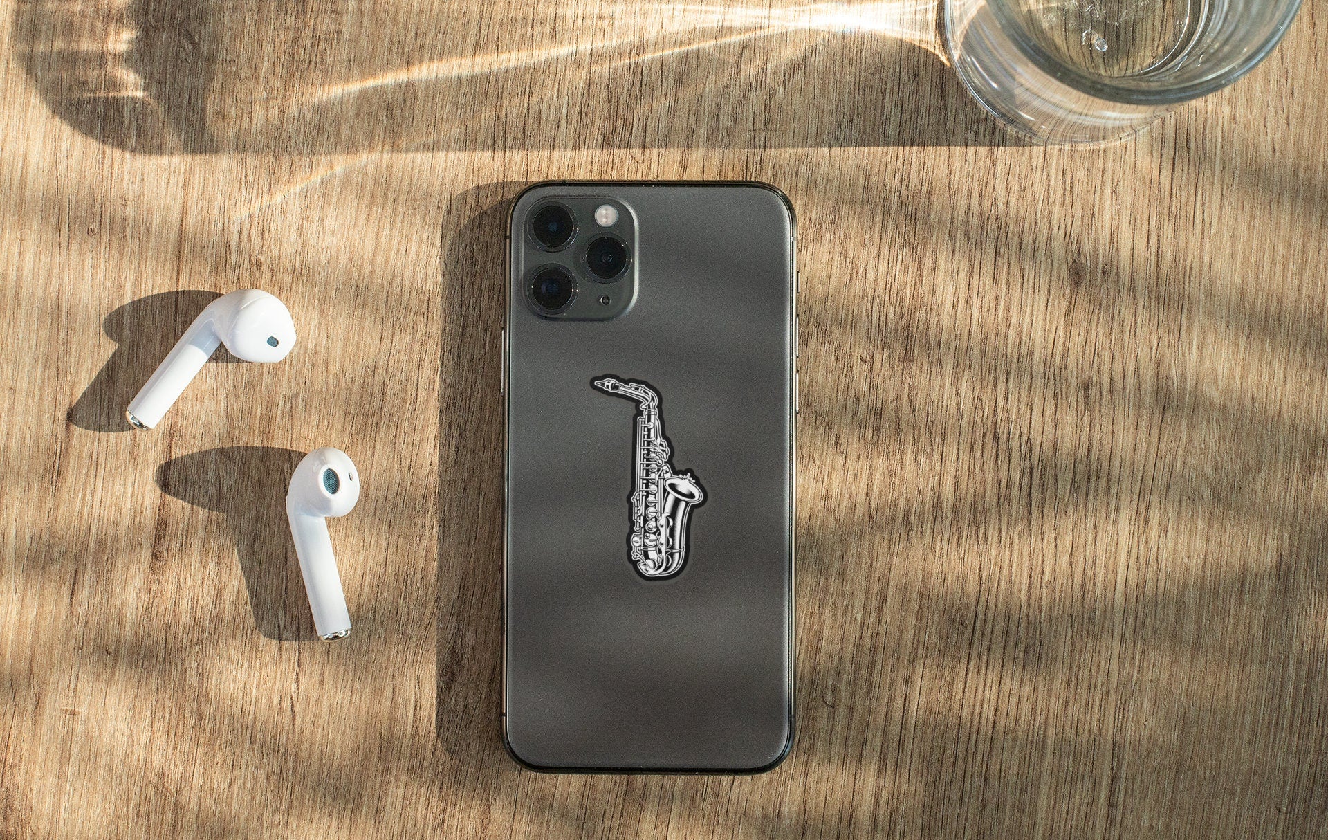 an iphone case with a picture of a saxophone on it