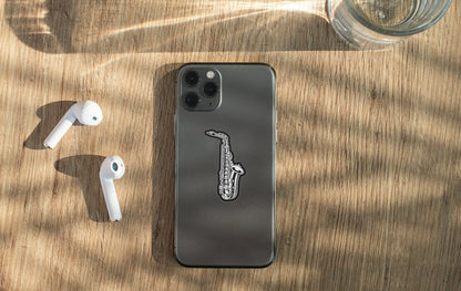 an iphone case with a picture of a saxophone on it